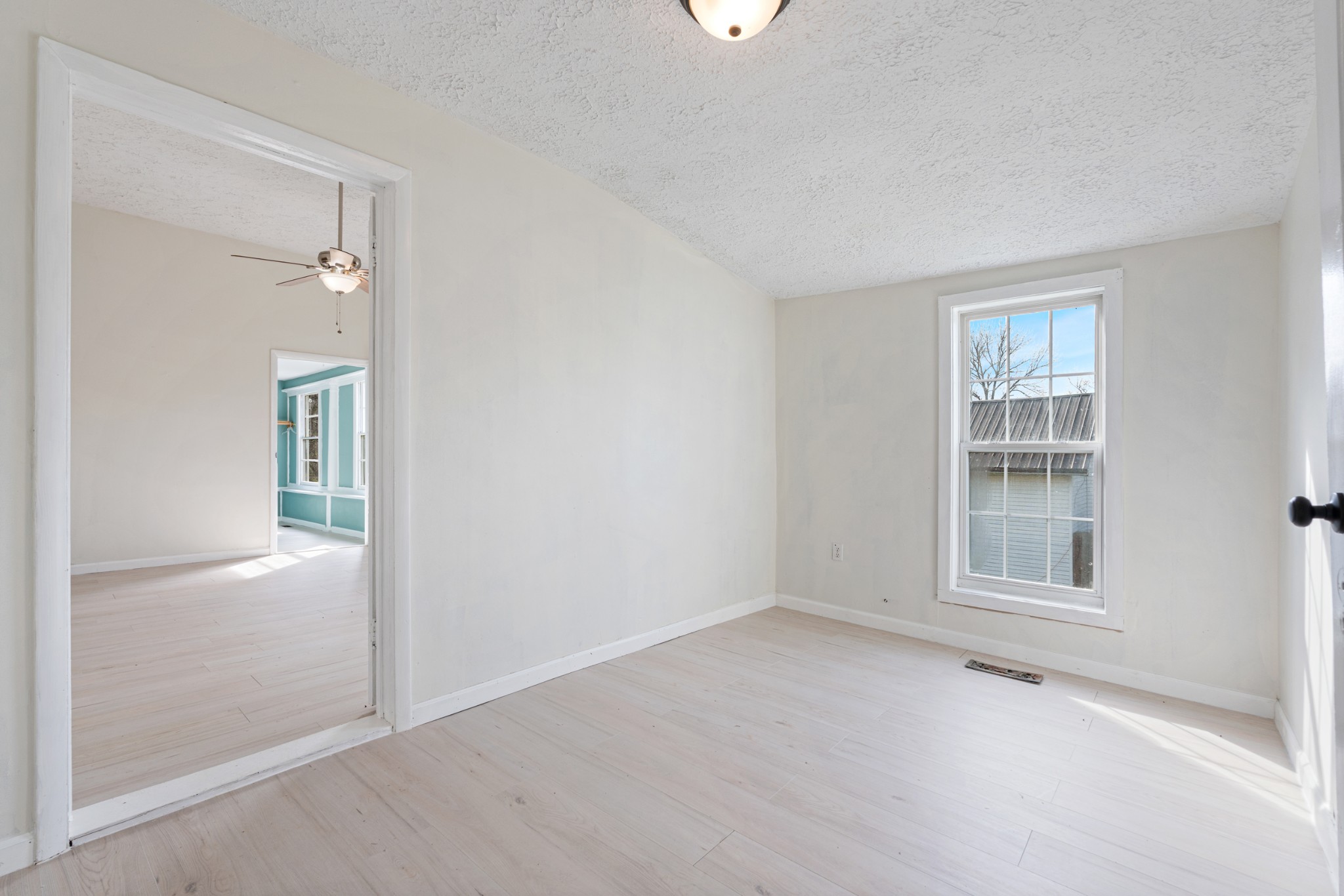 126 West End Avenue Centerville, TN 37033 - Photo 27 of 37 an empty room with windows and closet