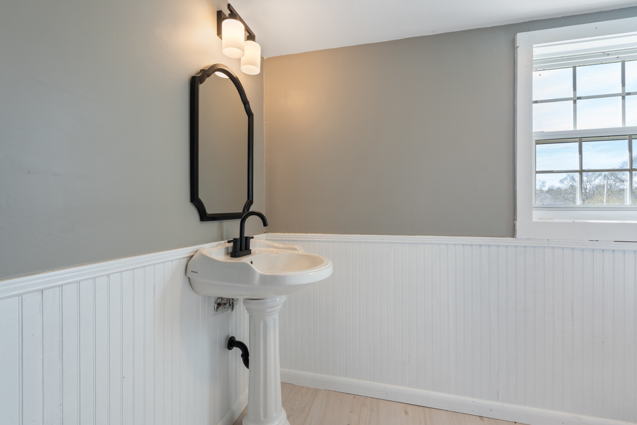 126 West End Avenue Centerville, TN 37033 - Photo 29 of 37 a bathroom with a sink and a mirror