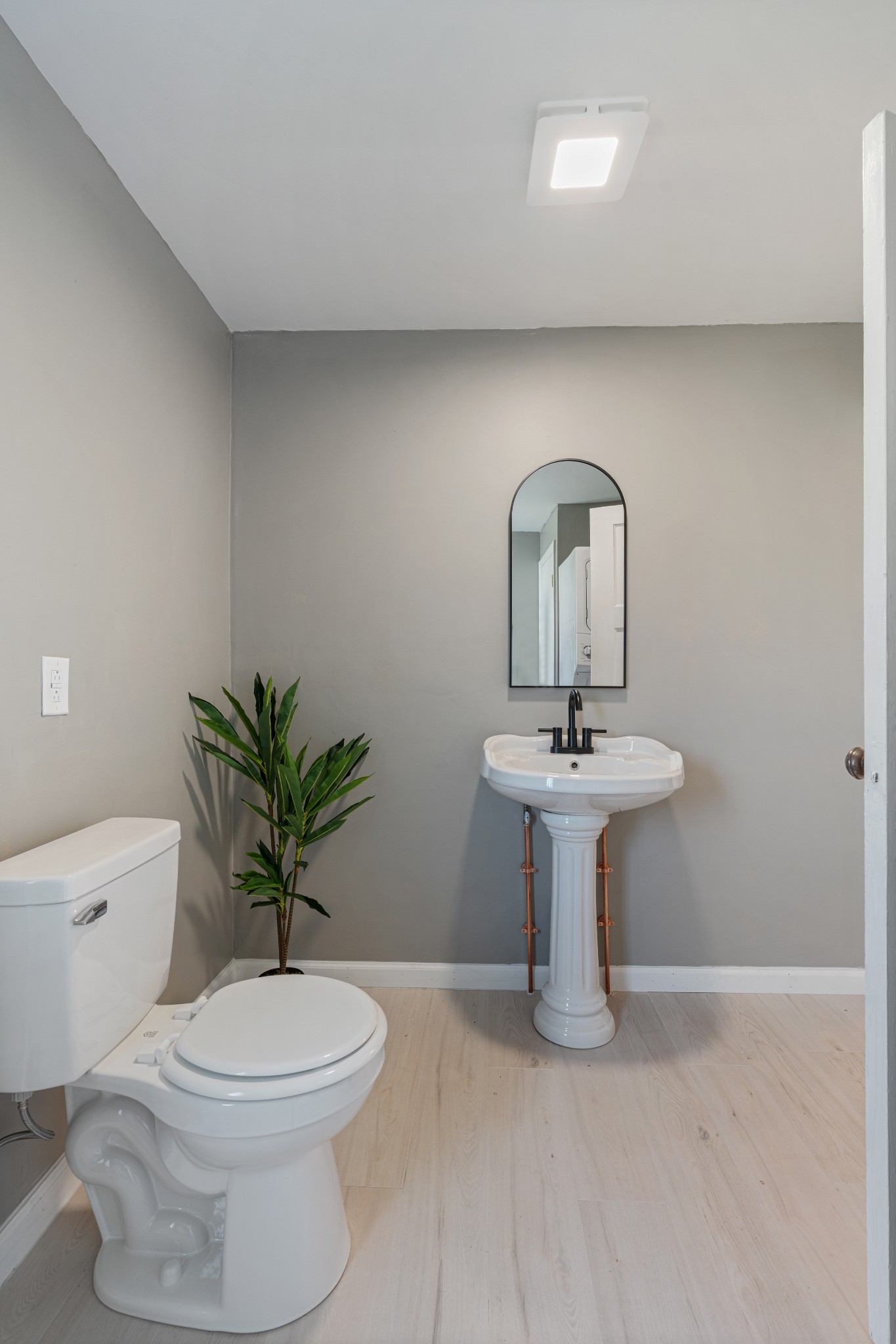 126 West End Avenue Centerville, TN 37033 - Photo 35 of 37 a bathroom with a toilet sink and mirror