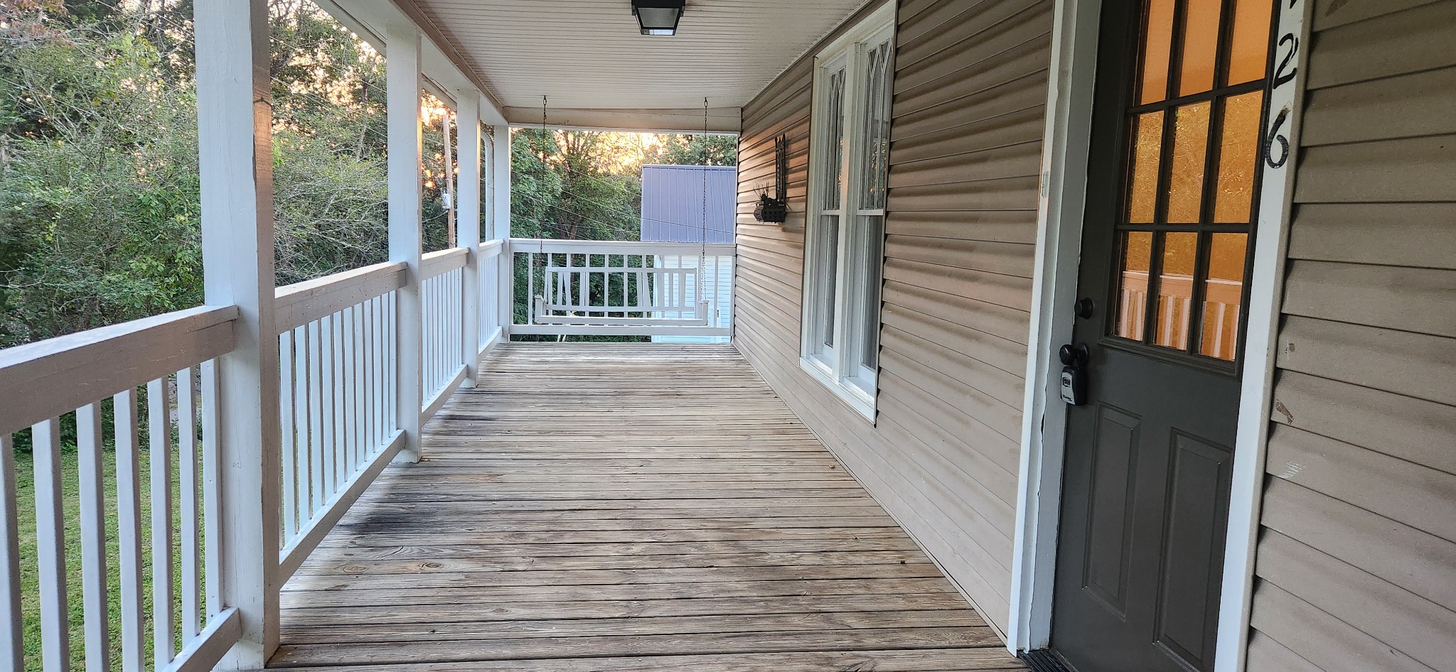 126 West End Avenue Centerville, TN 37033 - Photo 8 of 28 a view of a balcony with wooden floor