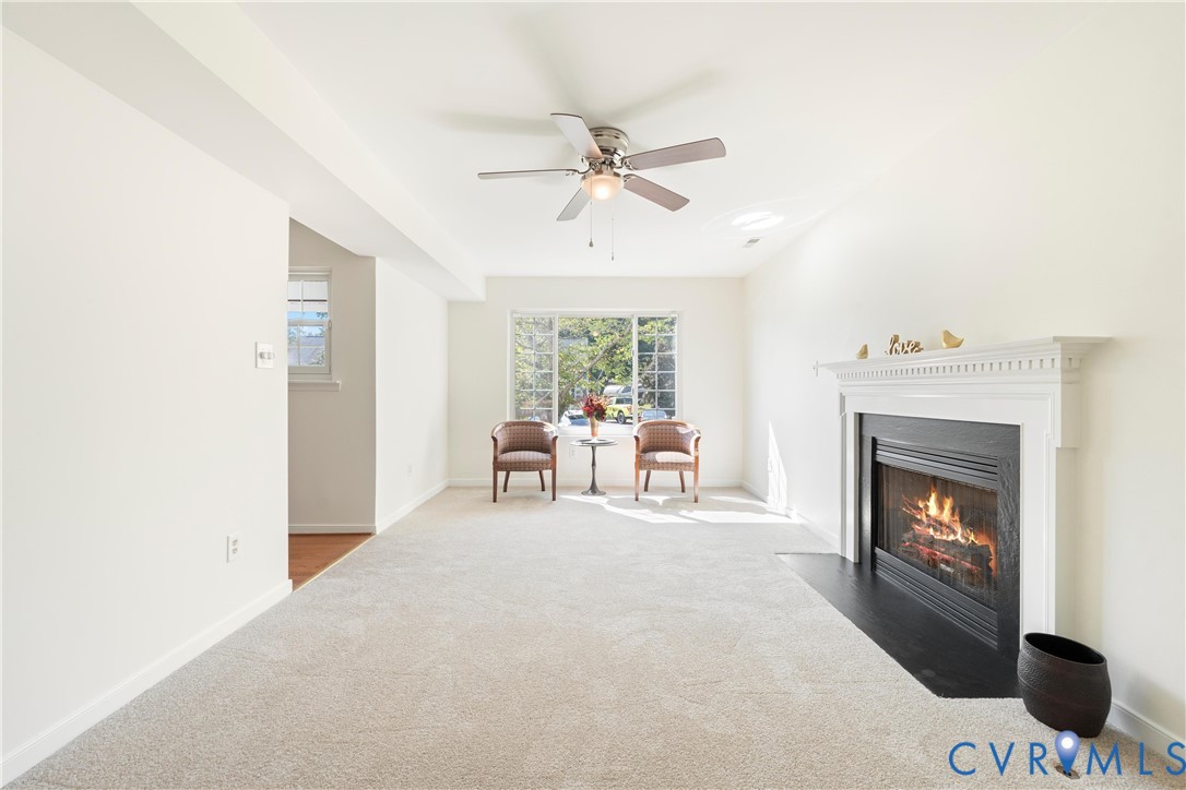 3908 Trickling Brook Drive Henrico, VA 23228 - Photo 12 of 47 Famly room featuring carpet flooring, a fireplace