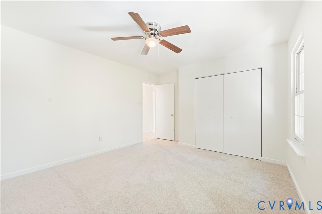 3908 Trickling Brook Drive Henrico, VA 23228 - Photo 29 of 47 Bedroom featuring light carpet, a ceiling fan, and