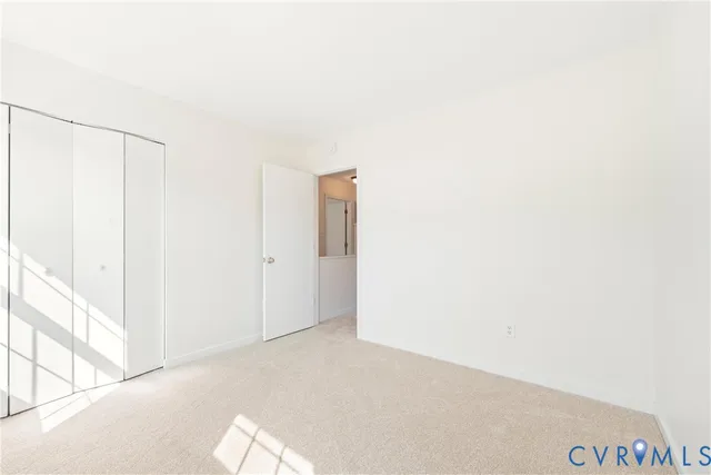 a view of a room that has a window in it