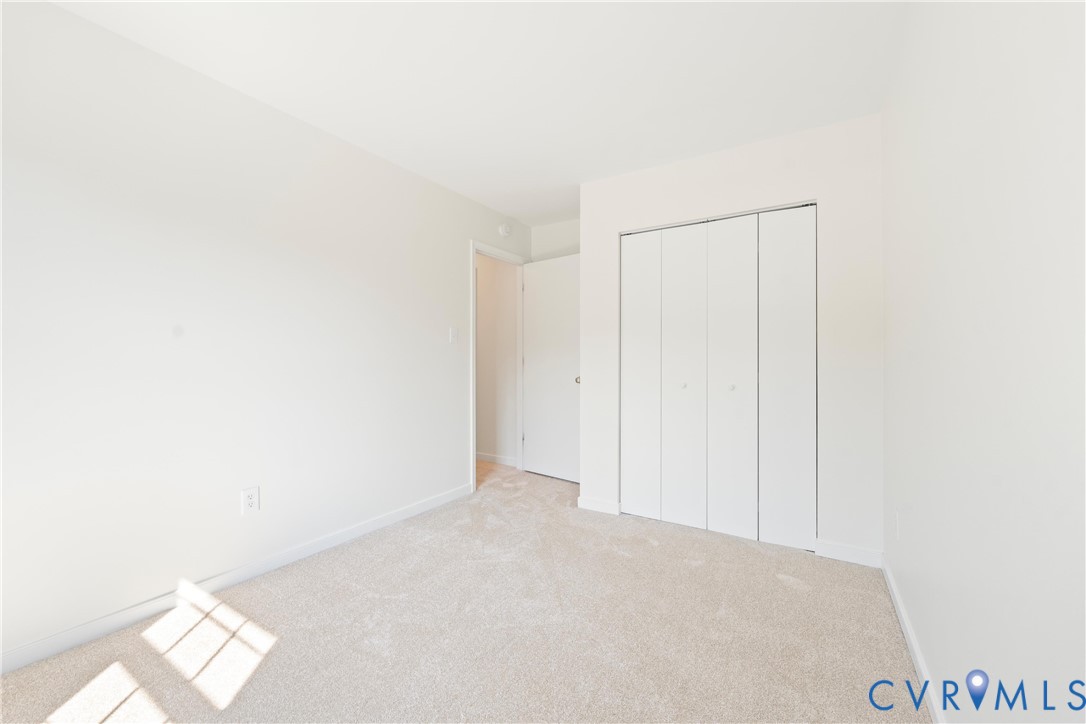 3908 Trickling Brook Drive Henrico, VA 23228 - Photo 34 of 47 Bedroom with carpet flooring and a closet