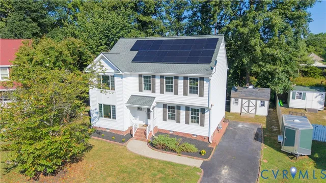 a view of backyard with a deck and wooden floor