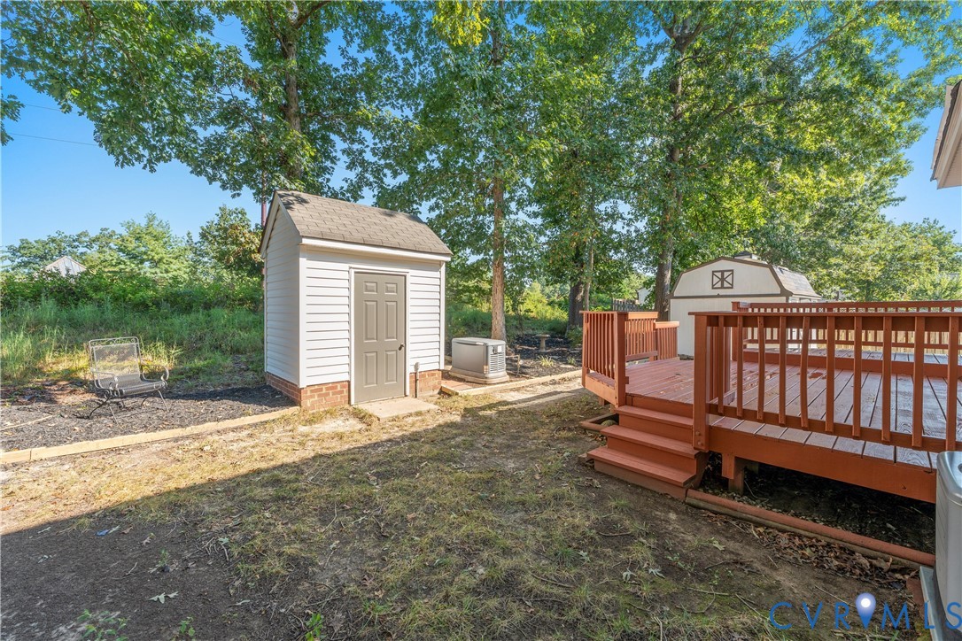 3908 Trickling Brook Drive Henrico, VA 23228 - Photo 40 of 47 View of yard featuring a shed, Whole house generat