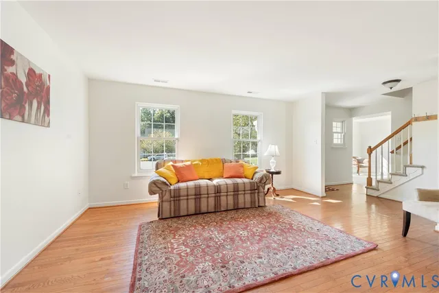 a bedroom with a bed and a table