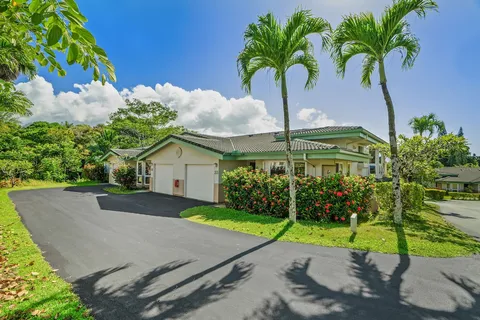 a house view with a garden space