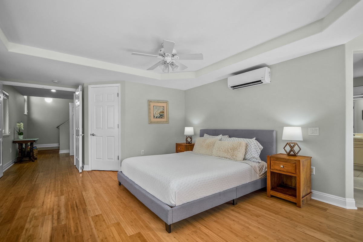 4141 Lei O Papa Road, Unit 33 Princeville, HI 96722 - Photo 10 of 22 a bedroom with a bed and wooden floor