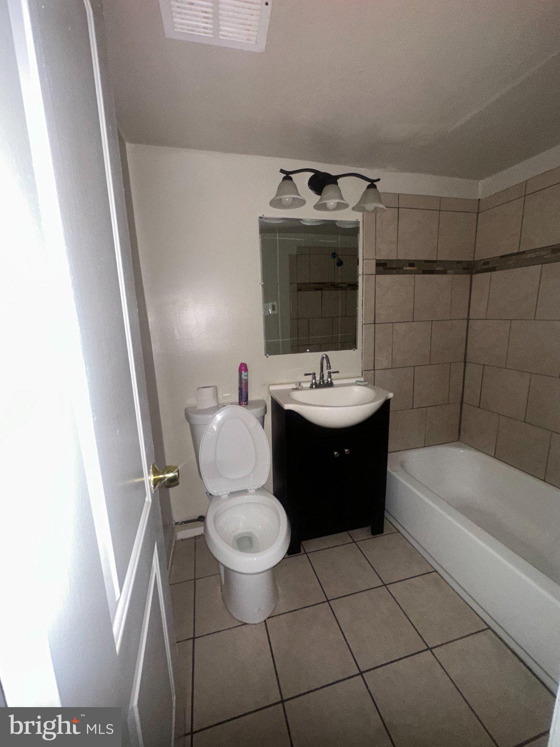 3817 Swann Road, Unit 101 Suitland, MD 20746 - Photo 8 of 8 Modern bathroom with sleek finishes.
