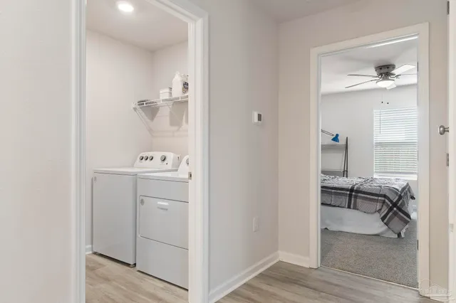 a en suite bathroom with a sink a mirror and vanity