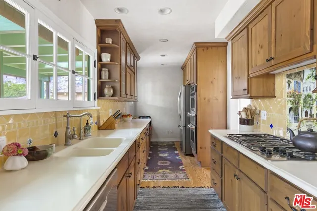 a utility room with cabinets
