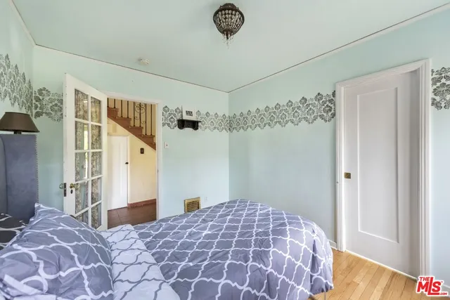 a view of a hallway with windows