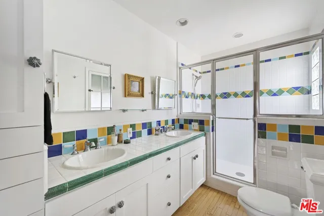 a view of a balcony with wooden floor