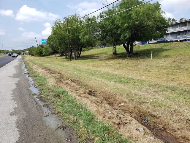 a view of swimming pool with a yard