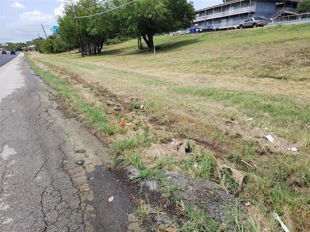 a view of a backyard of a house