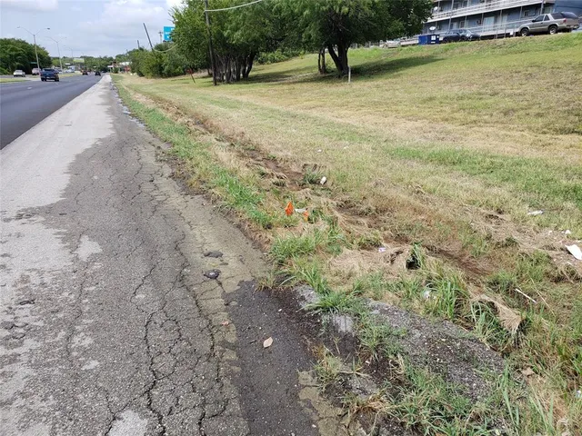 a view of swimming pool with a yard
