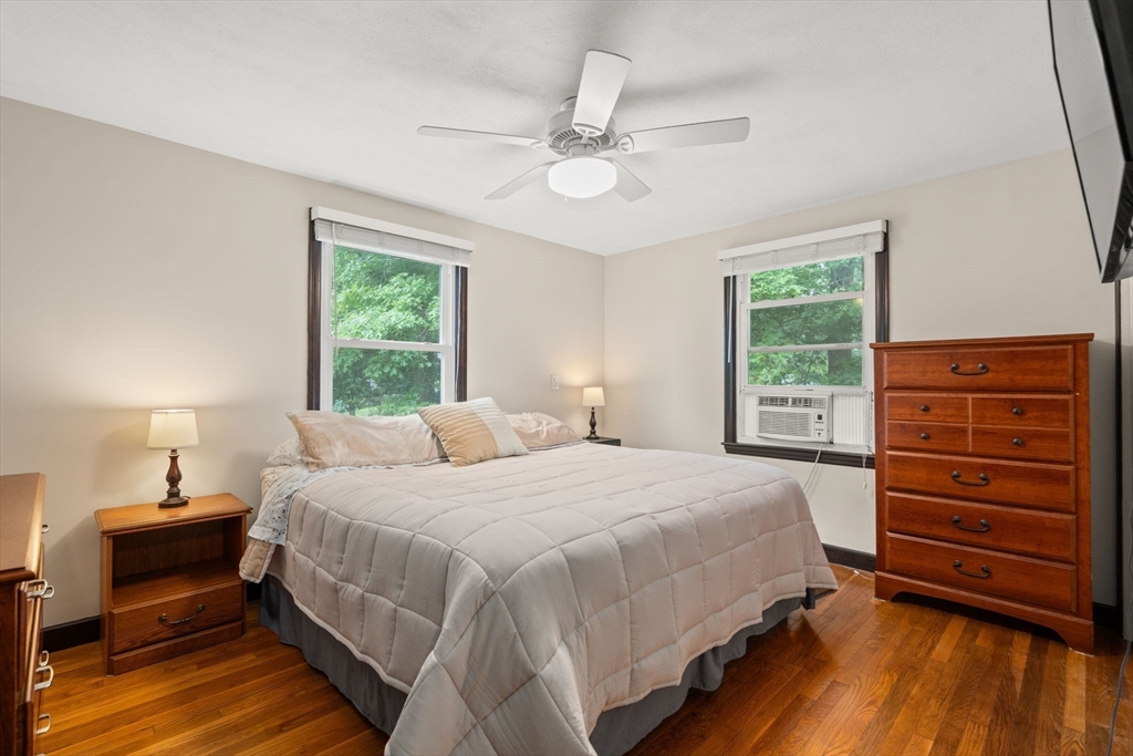 9 Laurel Lane Bellingham, MA 02019 - Photo 23 of 30 a bedroom with a bed and a dresser