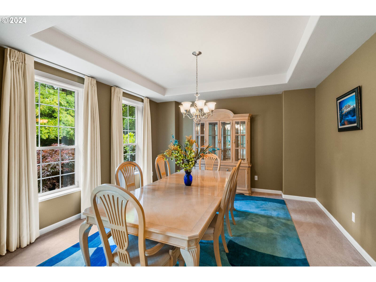 31500 Northwest 13th Avenue Ridgefield, WA 98642 - Photo 13 of 48 a view of a dining room with furniture wooden floor and chandelier