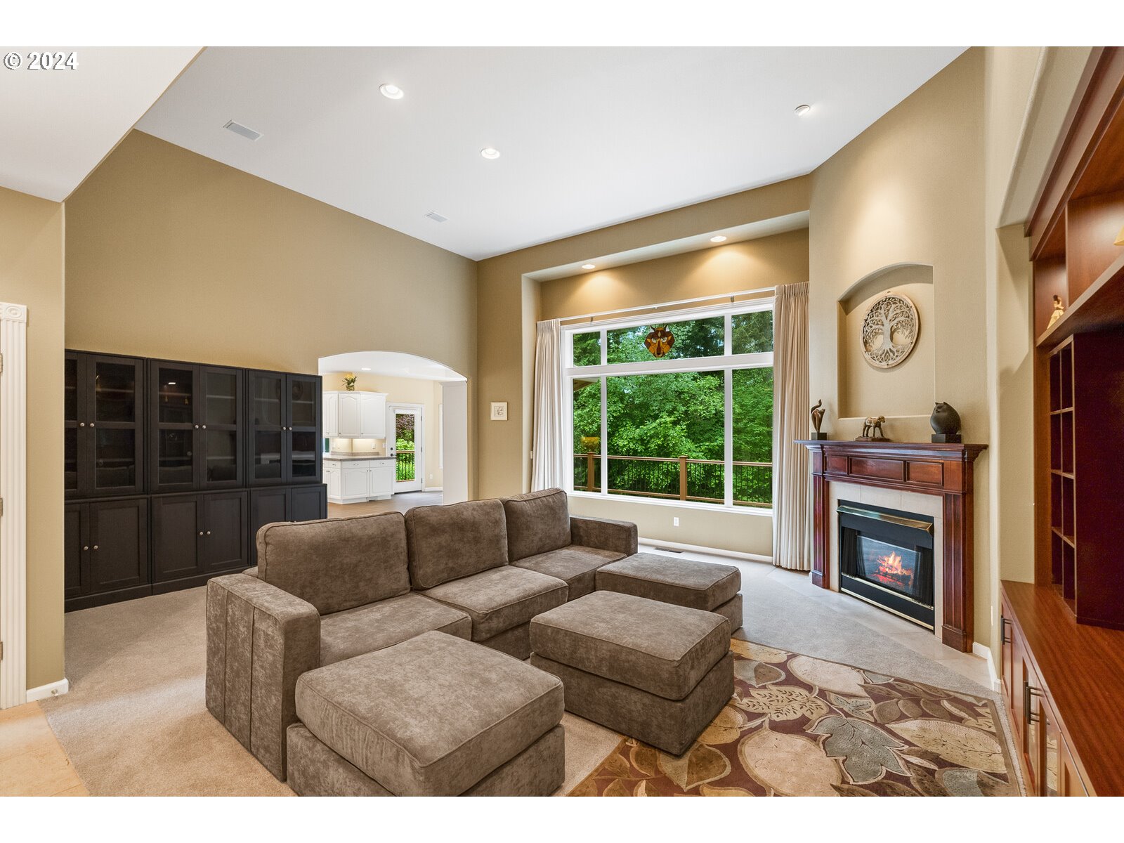 31500 Northwest 13th Avenue Ridgefield, WA 98642 - Photo 14 of 48 a living room with fireplace furniture and a large window