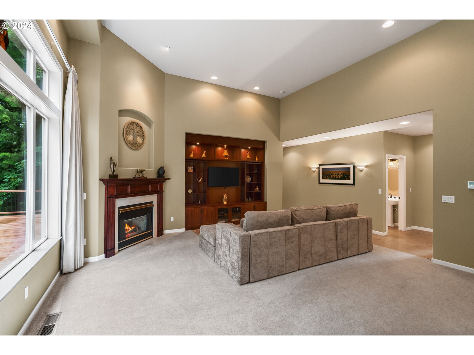 31500 Northwest 13th Avenue Ridgefield, WA 98642 - Photo 16 of 48 a living room with furniture and a flat screen tv