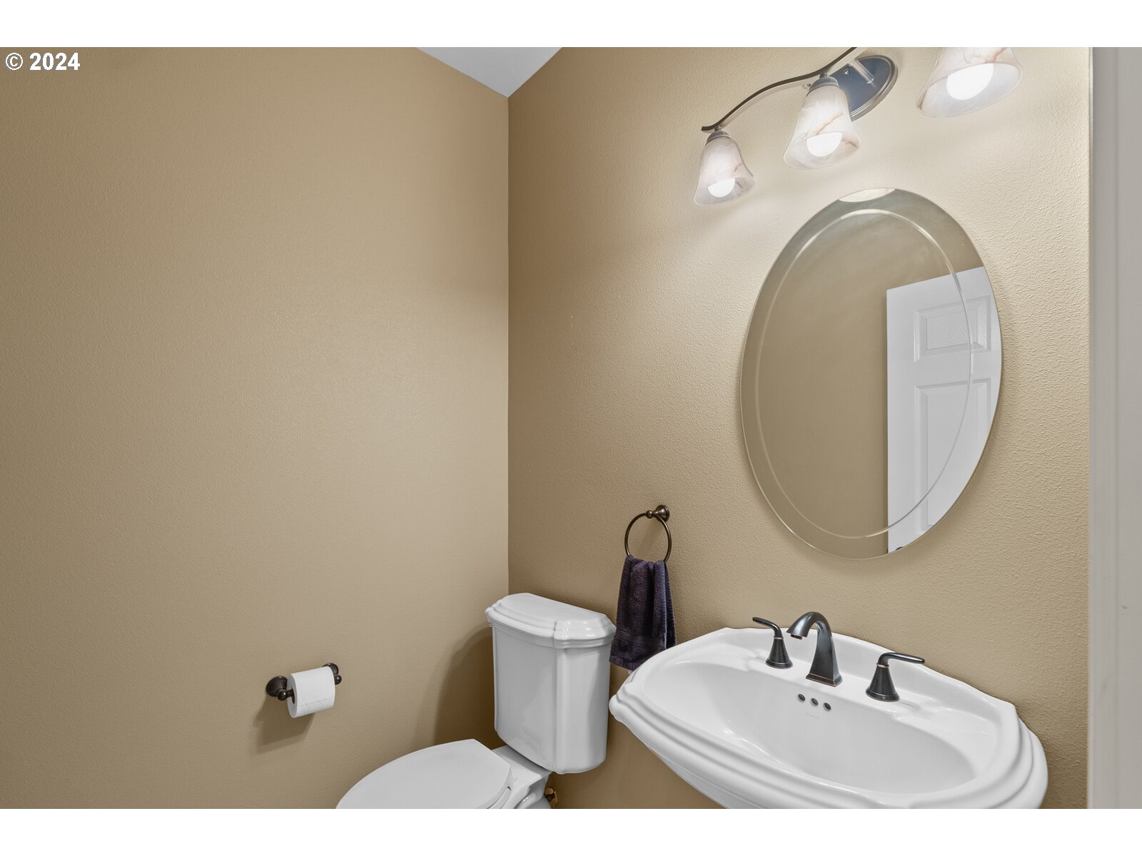 31500 Northwest 13th Avenue Ridgefield, WA 98642 - Photo 17 of 48 a bathroom with a sink and mirror