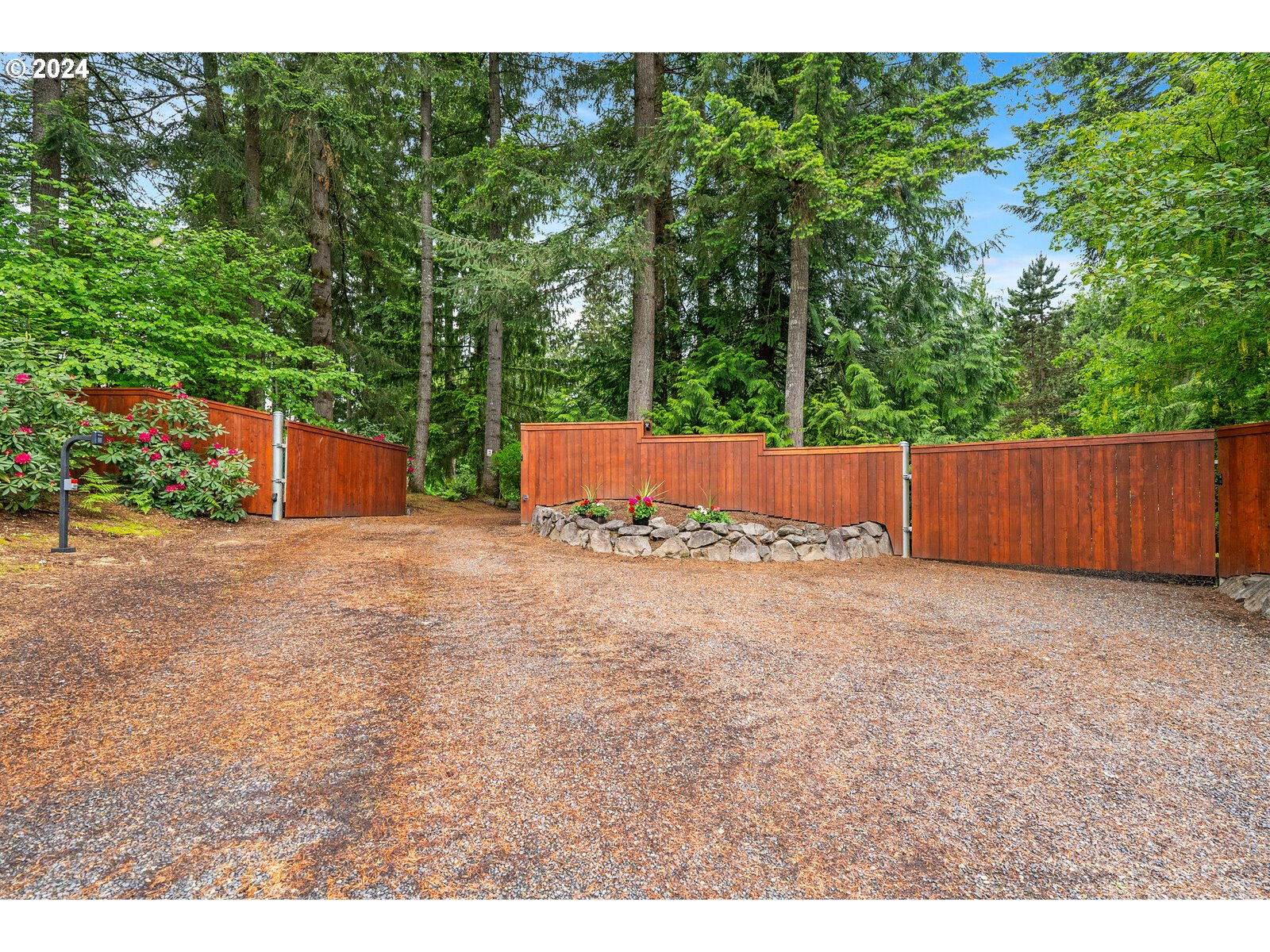 31500 Northwest 13th Avenue Ridgefield, WA 98642 - Photo 2 of 48 a backyard of a house with a yard and outdoor seating