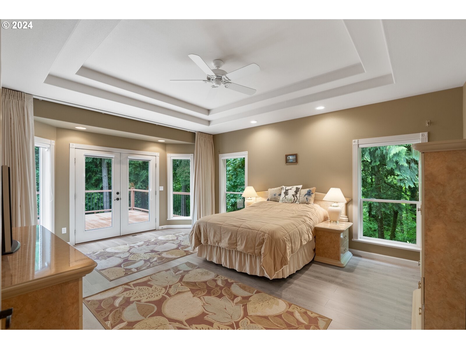 31500 Northwest 13th Avenue Ridgefield, WA 98642 - Photo 25 of 48 a bedroom with a large bed and a large window