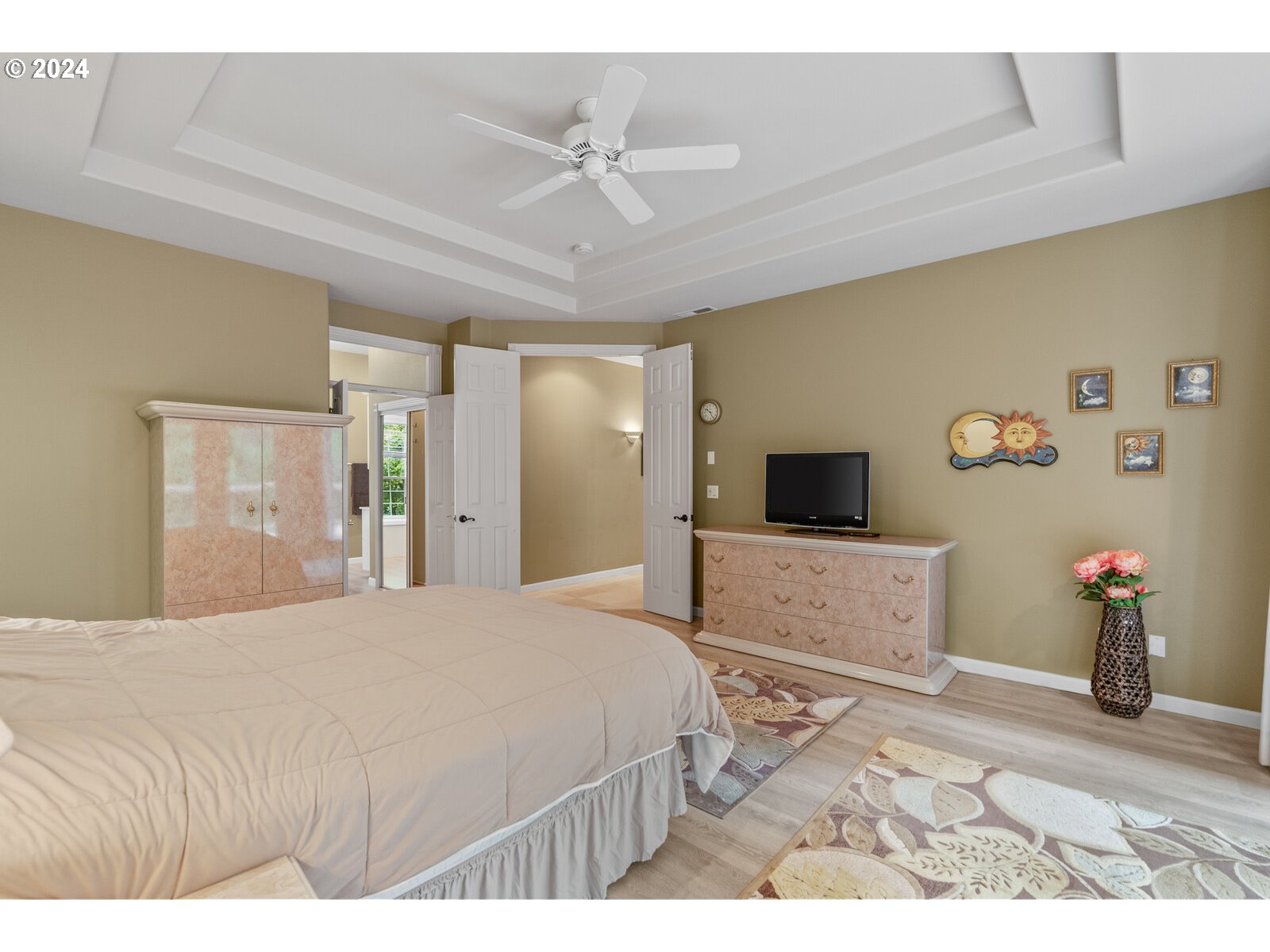 31500 Northwest 13th Avenue Ridgefield, WA 98642 - Photo 26 of 48 a bedroom with a bed and a flat screen tv