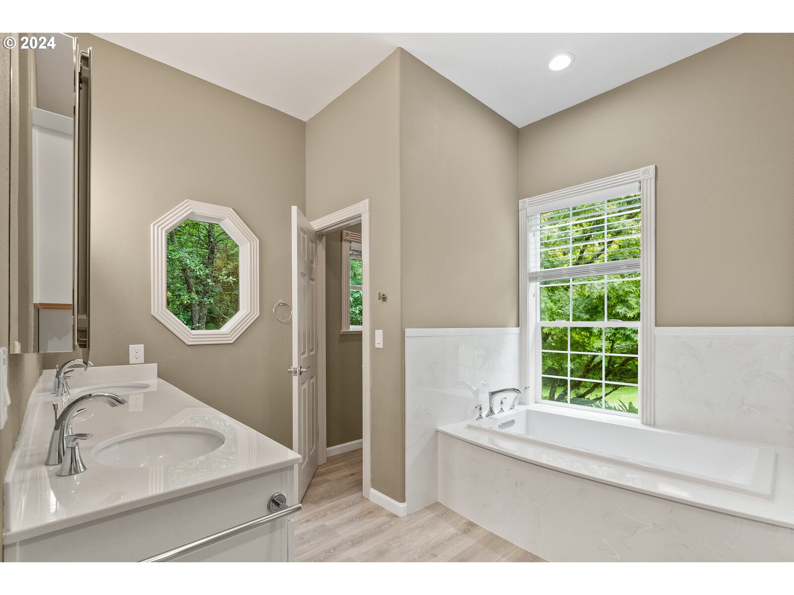 31500 Northwest 13th Avenue Ridgefield, WA 98642 - Photo 30 of 48 a bathroom with a sink mirror and window