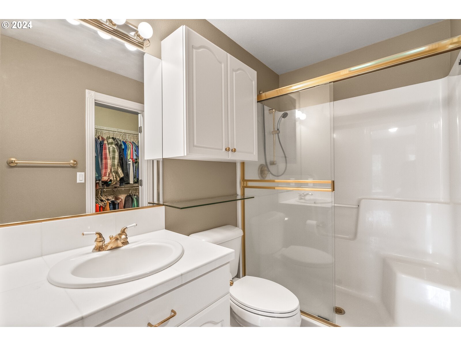 31500 Northwest 13th Avenue Ridgefield, WA 98642 - Photo 34 of 48 a bathroom with a sink a toilet and a mirror