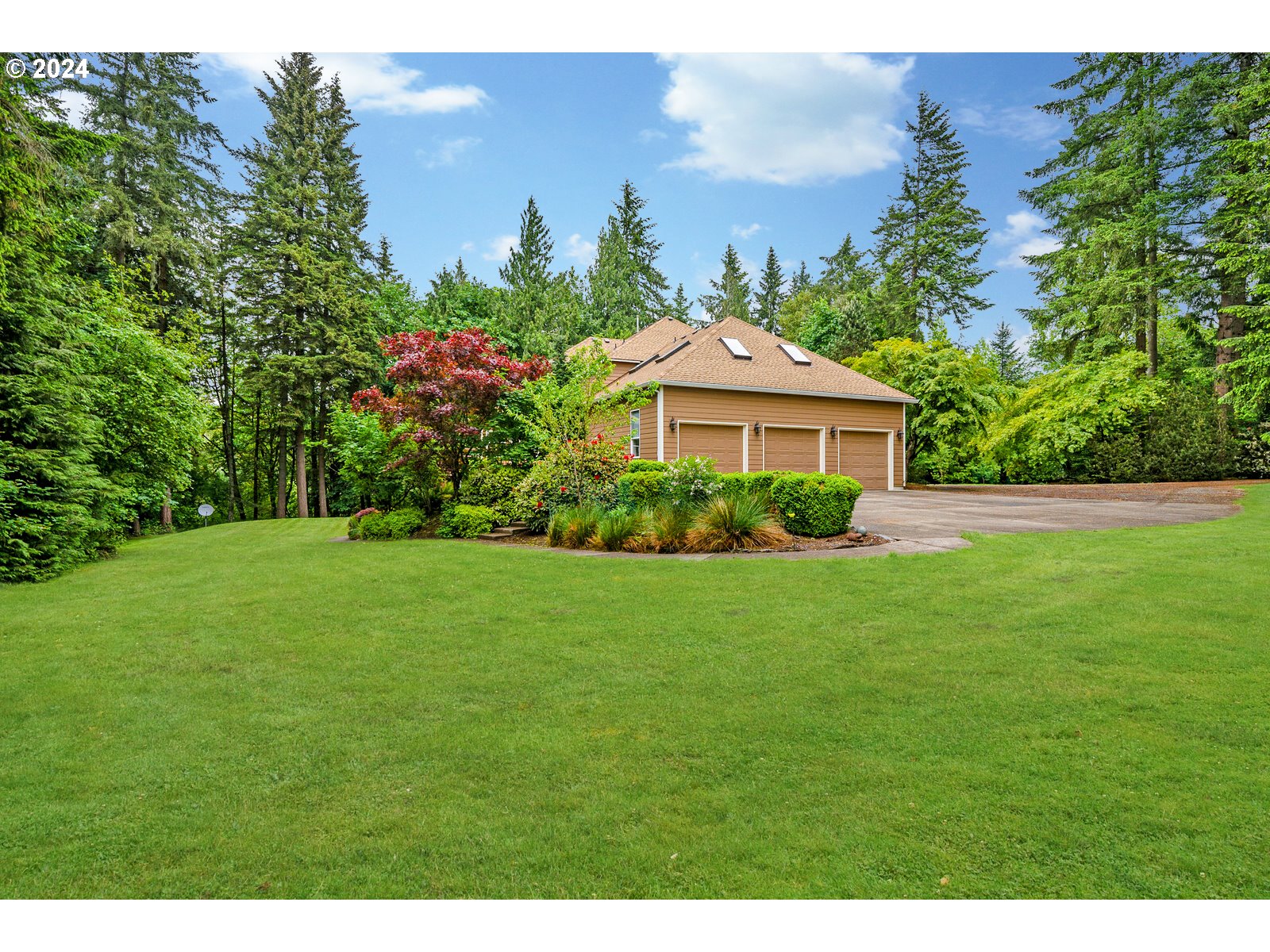 31500 Northwest 13th Avenue Ridgefield, WA 98642 - Photo 5 of 48 a front view of a house with a yard