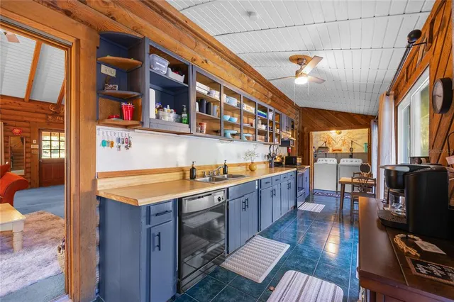 a bedroom with a bed and a mirror