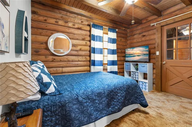 a bathroom with a sink mirror vanity and toilet