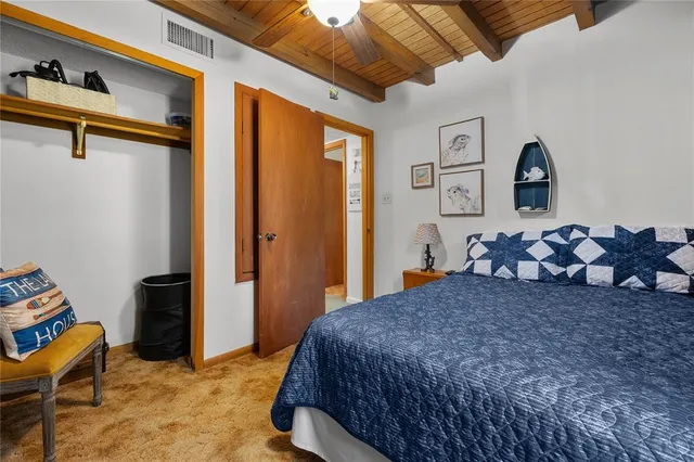 a outdoor living space with furniture and a fireplace