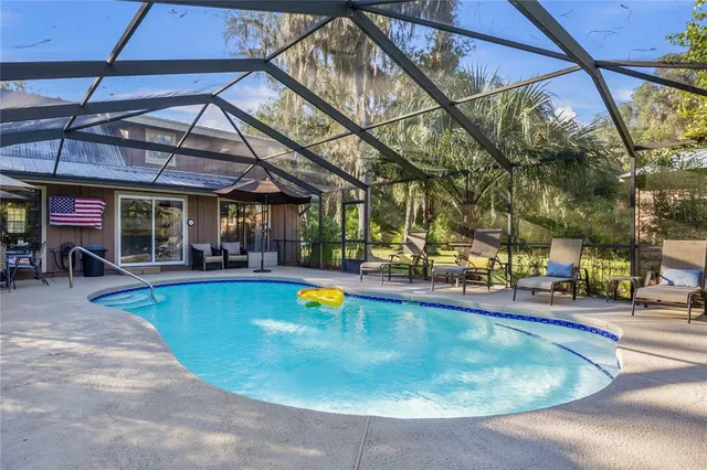 a bathroom with a tub and shower
