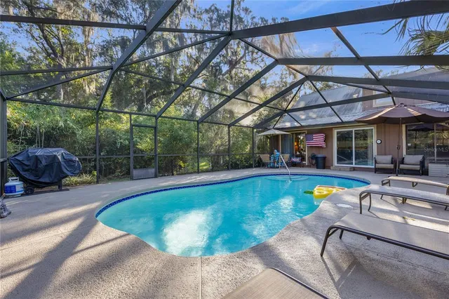 a outdoor space with lots of furniture and garden view