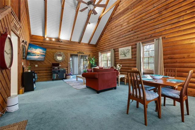 a outdoor living space with furniture and a fireplace