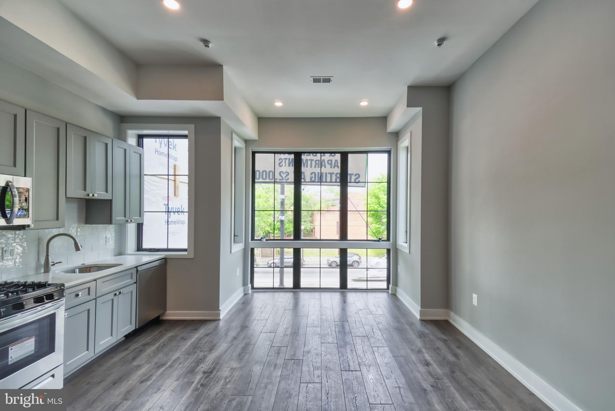 2013 Benning Road Northeast, Unit 5 Washington, DC 20002 - Photo 6 of 15 Floor to Ceiling Windows