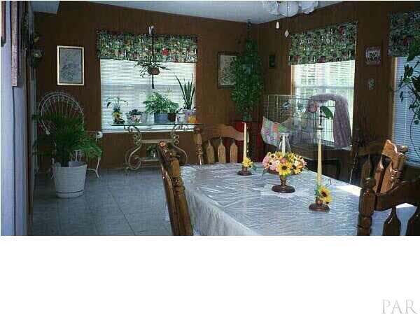 5440 Kauffman Road Milton, FL 32583 - Photo 11 of 22 Florida Room w Ceramic Tile Floor