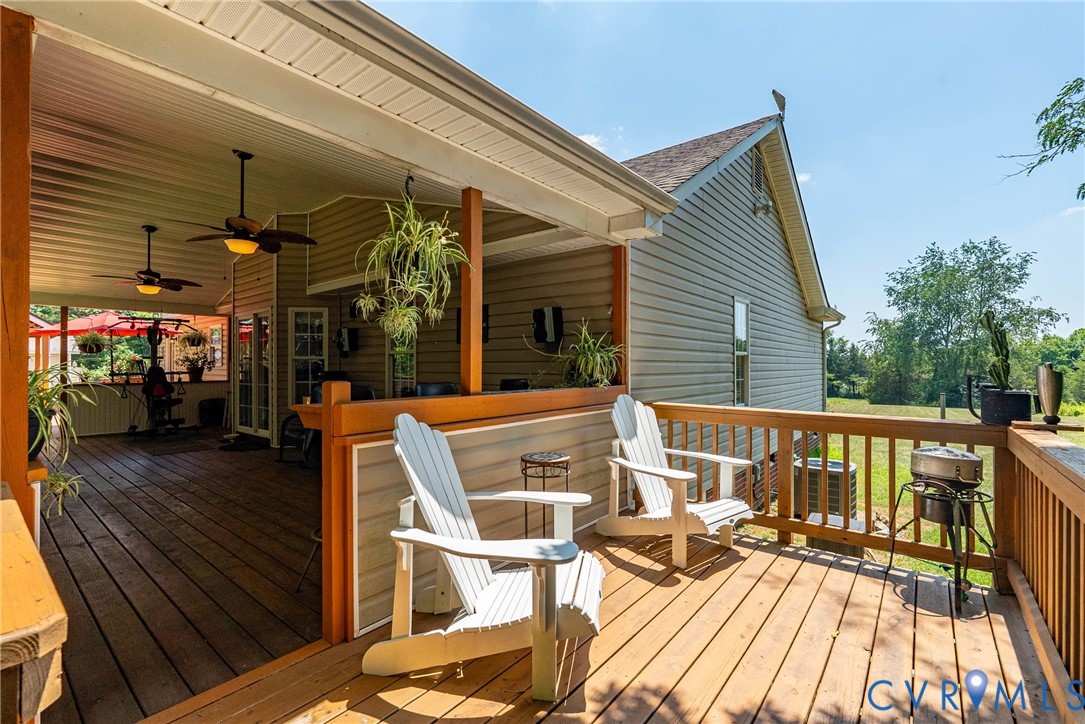197 Goshen Road Cumberland, VA 23040 - Photo 12 of 70 Expansive wood deck with a partial covered area