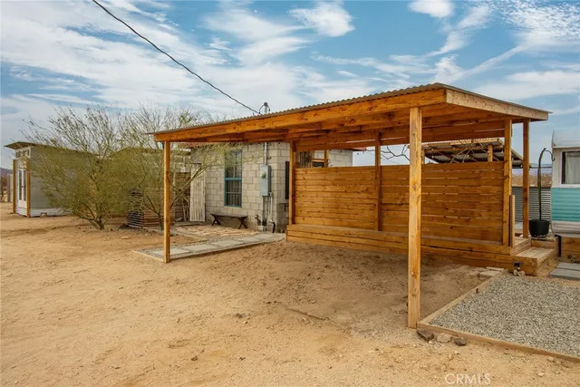 a view of a room with wooden walls