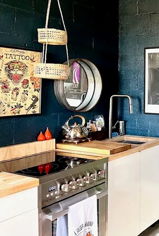 a kitchen with a stove and a microwave