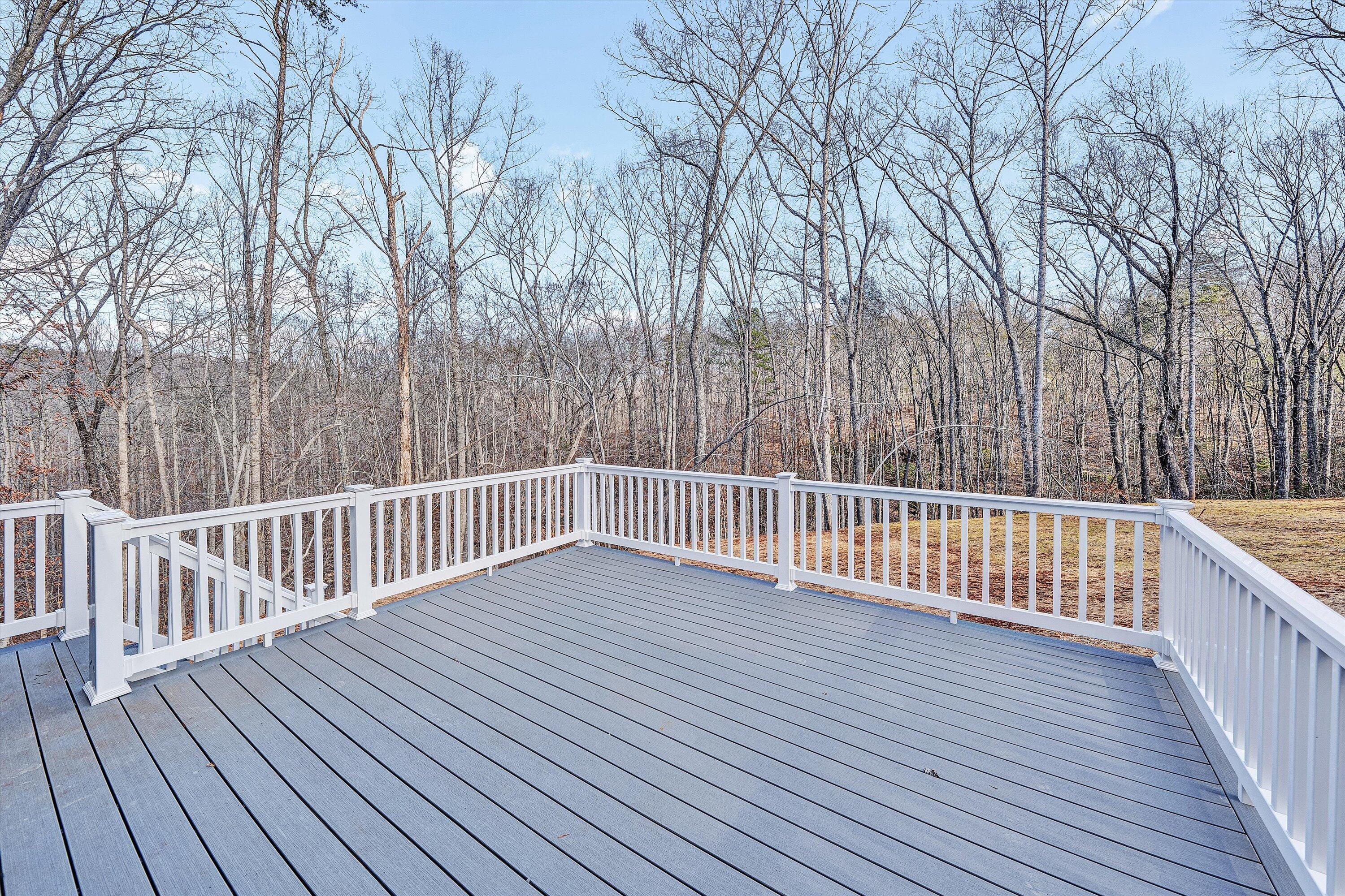 103 Bluff Court Moneta, VA 24121 - Photo 29 of 63 a view of deck with wooden floor and fence