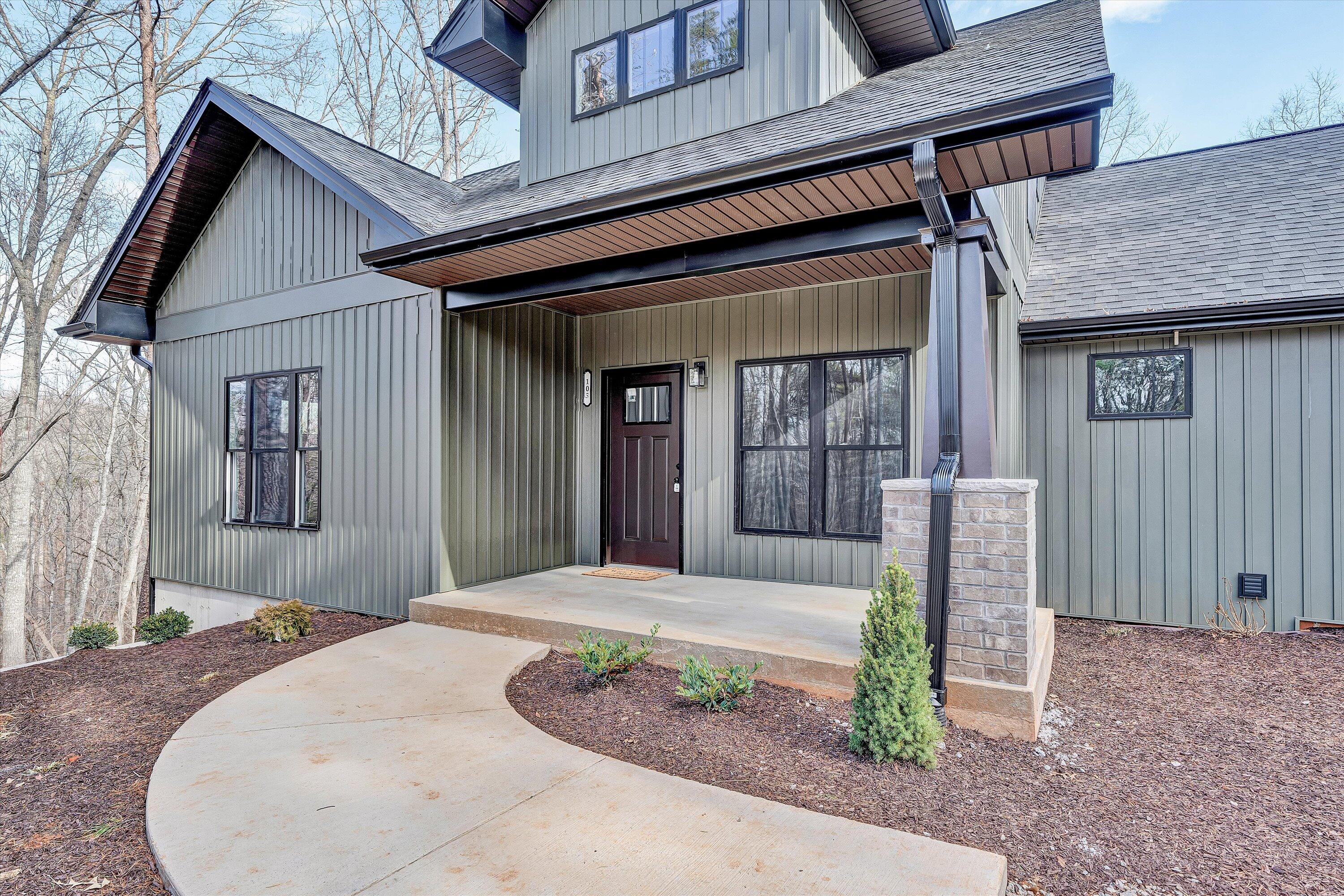 103 Bluff Court Moneta, VA 24121 - Photo 50 of 63 a front view of a house with a porch