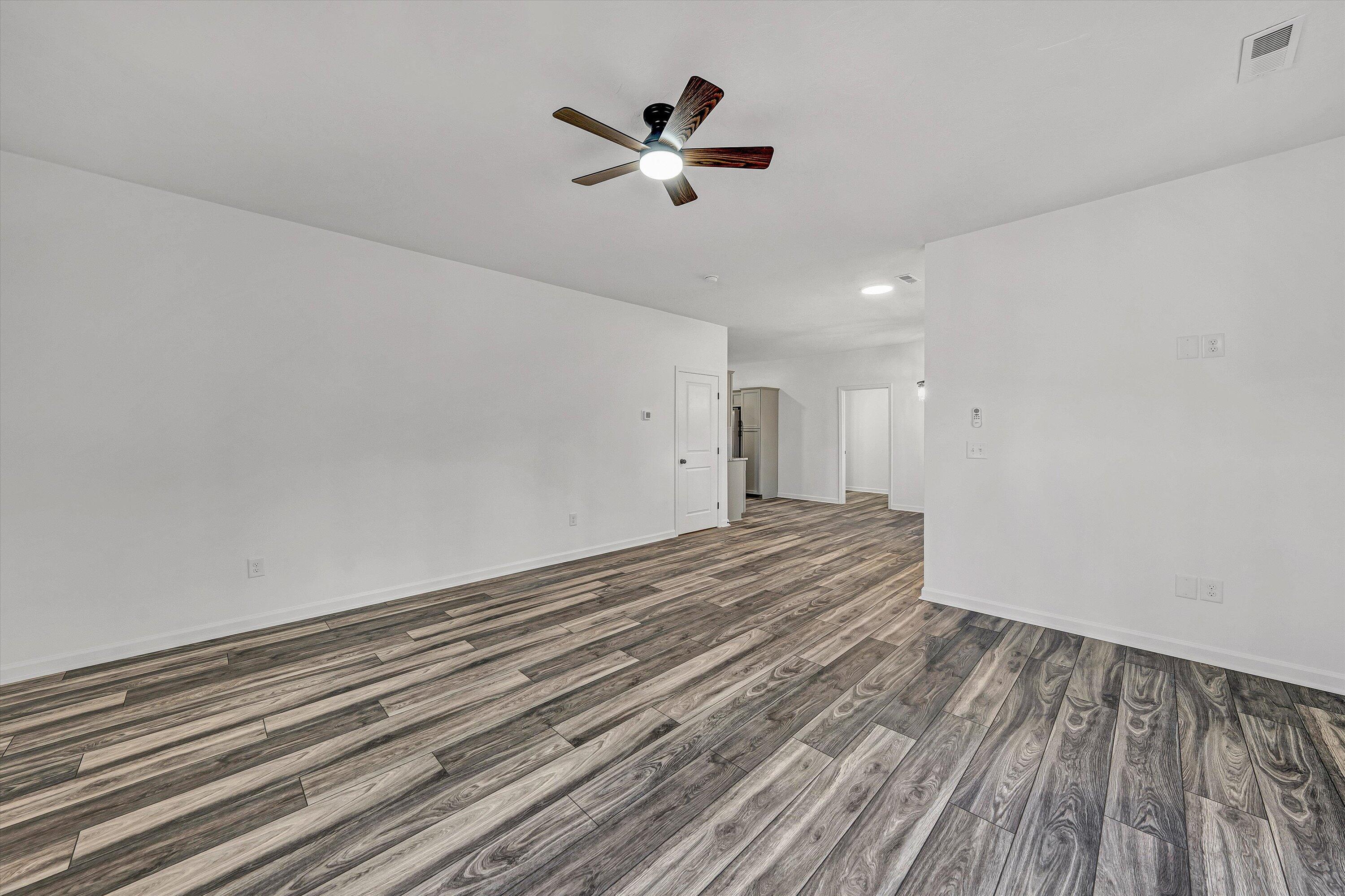 103 Bluff Court Moneta, VA 24121 - Photo 5 of 63 a view of empty room with wooden floor