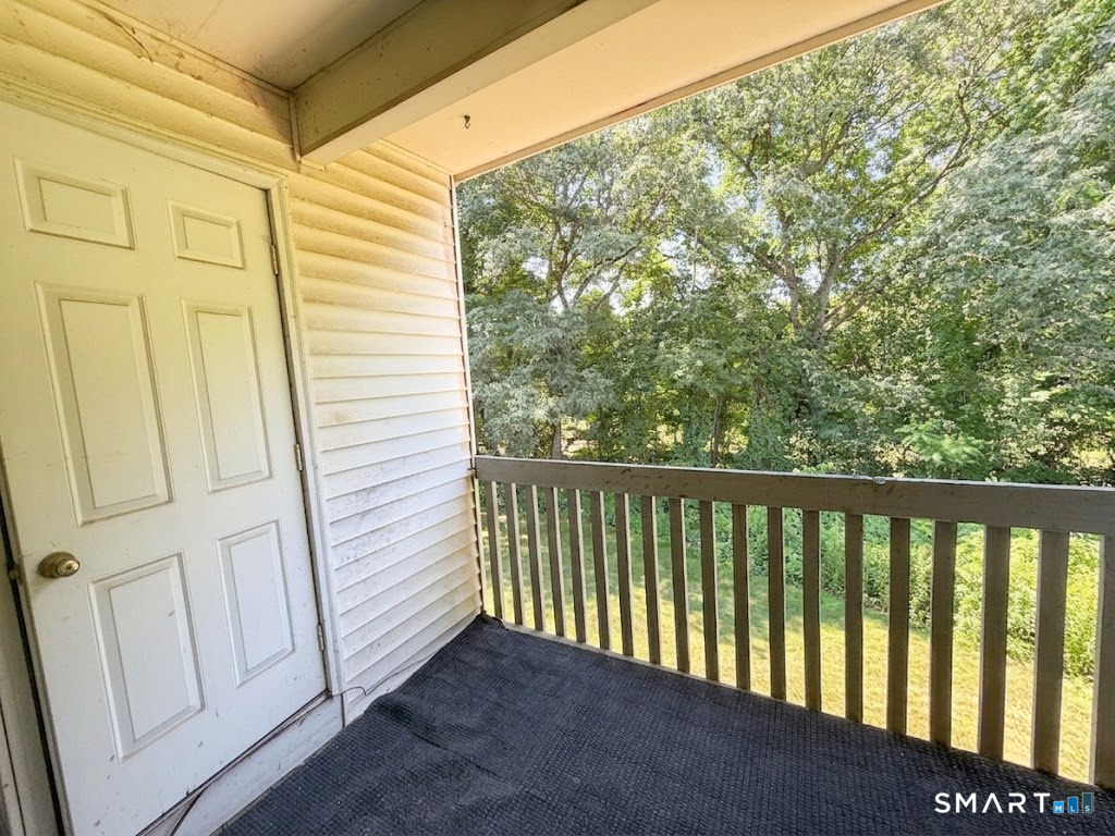 6 Concorde Way, Unit B4 Windsor Locks, CT 06096 - Photo 6 of 16 SLIDERS TO BACK DECK FACING PRIVATE WOODS