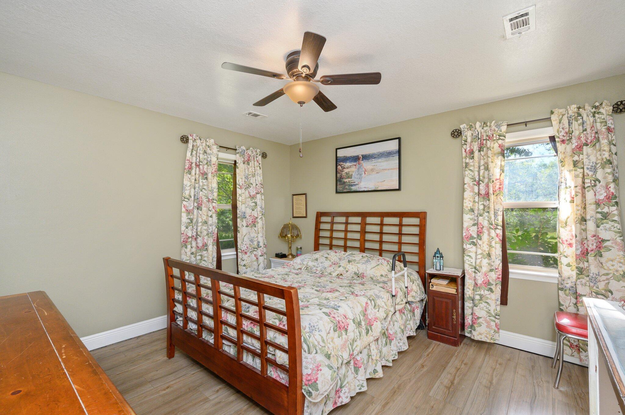 4082 Painter Branch Road Crestview, FL 32539 - Photo 20 of 49 a bedroom with a bed and a window