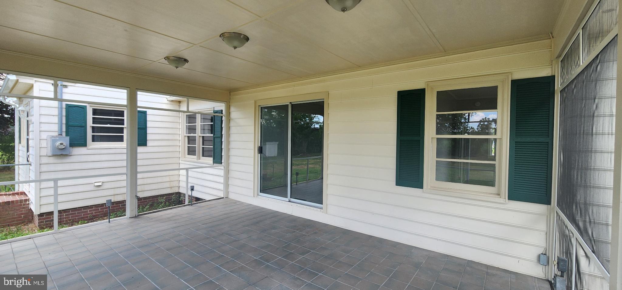 8432 Meadow Bridge Road Eden, MD 21822 - Photo 5 of 42 Spacious covered patio for outdoor living.