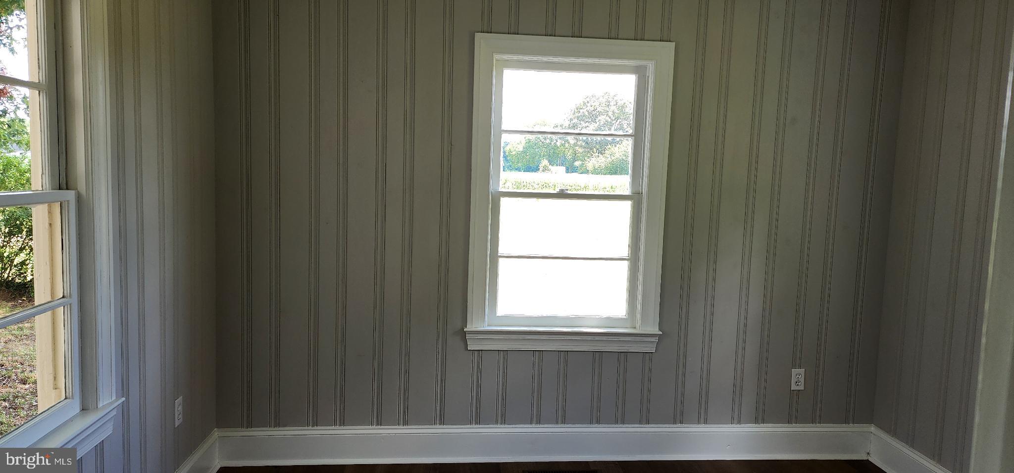 8432 Meadow Bridge Road Eden, MD 21822 - Photo 10 of 42 Bright and airy room with charming stripes.